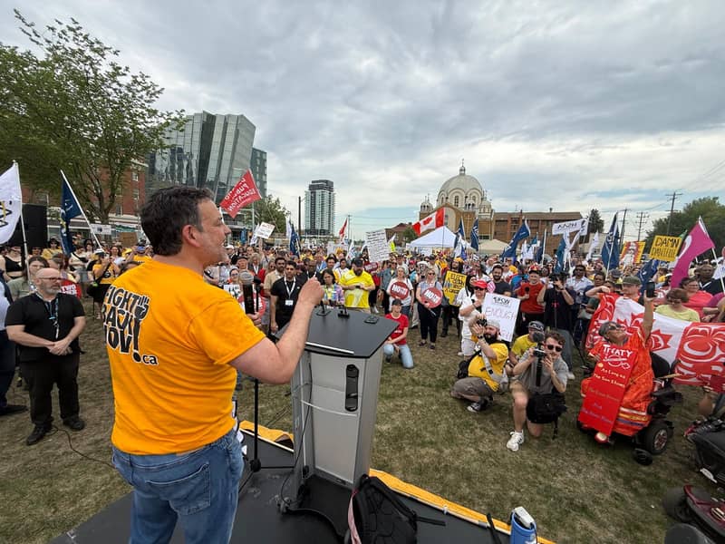 Speaker addressing the Edmonton rally